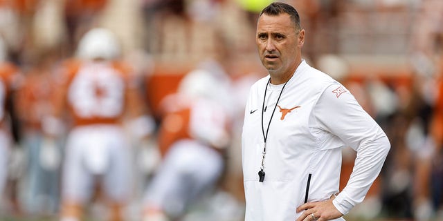 Head coach Steve Sarkisian of the Texas Longhorns watches players warm up before a game against the Iowa State Cyclones at Darrell K Royal-Texas Memorial Stadium Oct. 15, 2022, in Austin, Texas. 