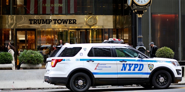 Trump settles lawsuit filed by protesters who claimed his security attacked them in 2015 2 A NYPD car waits at the Trump Tower on October 24, 2022 in New York City.