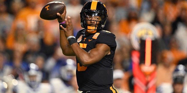 Hendon Hooker of the Tennessee Volunteers throws a pass against the Kentucky Wildcats in the first quarter at Neyland Stadium Oct. 29, 2022, in Knoxville, Tenn.