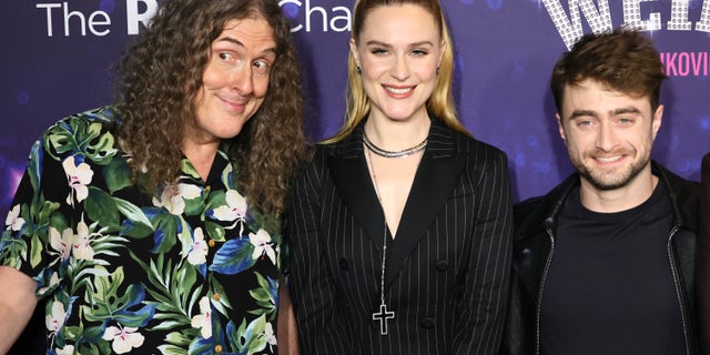 "Weird Al" Yankovic poses with Evan Rachel Wood and Daniel Radcliffe, who play Madonna and "Weird Al," respectively.