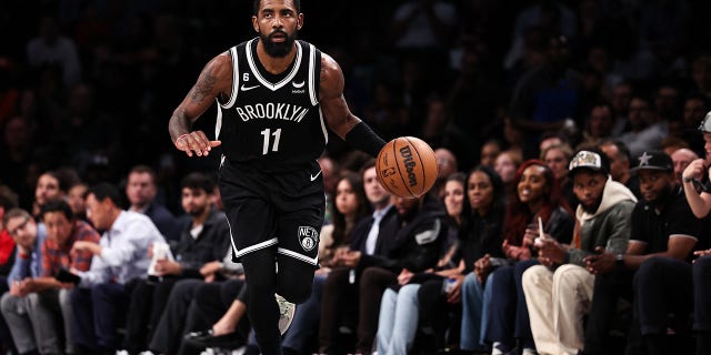 Kyrie Irving of the Brooklyn Nets brings the ball up the court during the third quarter of a game against the Chicago Bulls at Barclays Center Nov. 1, 2022, in New York City.