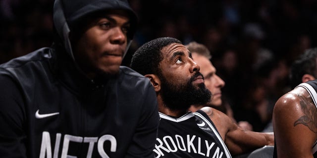 Kyrie Irving of the Brooklyn Nets looks on from the bench during the third quarter of a game against the Chicago Bulls at Barclays Center on November 1, 2022 in New York City.