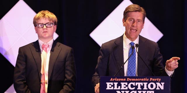 U.S. Rep. Greg Stanton, D-Ariz., speaks, alongside son Trevor, to supporters at an election night watch party at the Renaissance Phoenix Downtown Hotel on Nov. 8, 2022, in Phoenix.