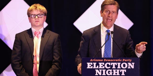 U.S. Rep. Greg Stanton, D-Ariz., speaks, alongside son Trevor, to supporters at an election night watch party at the Renaissance Phoenix Downtown Hotel on Nov. 8, 2022, in Phoenix.