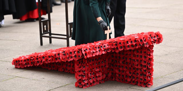The Royal Family's Twitter account shared several photos of the momentous event, as Camilla is seen shaking hands with individuals who visited the memorial.