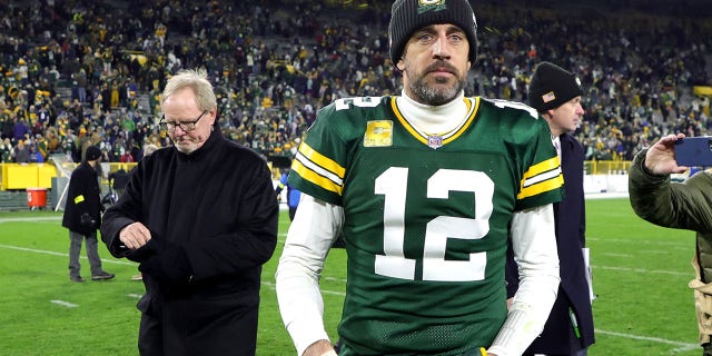 Aaron Rodgers, #12 of the Green Bay Packers, on the field after a win over the Dallas Cowboys at Lambeau Field on Nov. 13, 2022 in Green Bay, Wisconsin. 