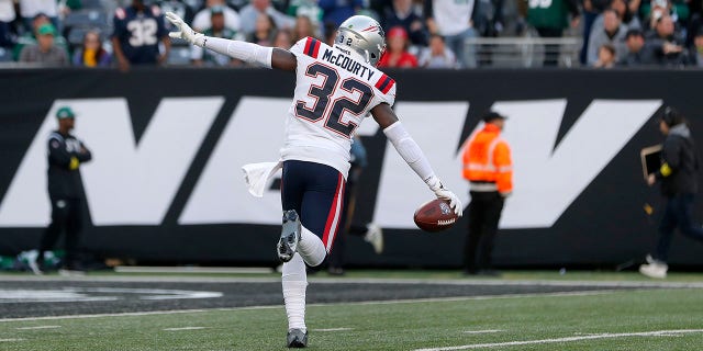 Devin McCourty #32 of the New England Patriots in action against the New York Jets at MetLife Stadium on October 30, 2022 in East Rutherford, New Jersey. The Patriots defeated the Jets 22-17. 