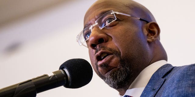 Sen. Raphael Warnock speaks at a campaign rally at the Tubman Museum on Nov. 17, 2022, in Macon, Georgia.