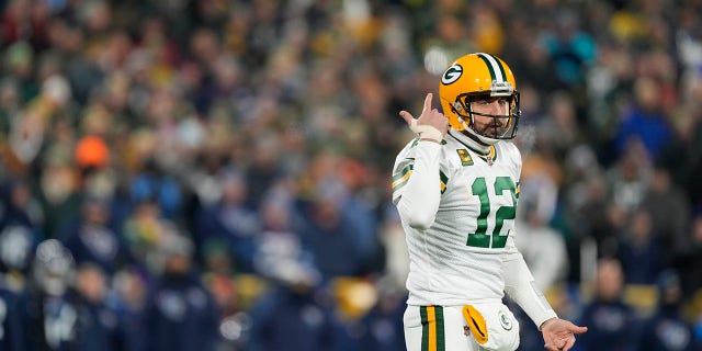 Aaron Rodgers of the Green Bay Packers reacts after a play against the Tennessee Titans during the first quarter of a game at Lambeau Field on November 17, 2022 in Green Bay, Wisconsin. 