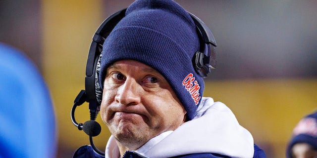 Mississippi Rebels head coach Lane Kiffin on the sideline during a game against the Arkansas Razorbacks at Donald W. Reynolds Razorback Stadium on November 19, 2022 in Fayetteville, Arkansas.  The Razorbacks defeated the Rebels 42-27.  