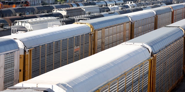 Freight cars sit in a rail yard on Nov. 22, 2022, in Wilmington, California.