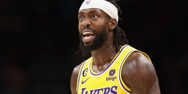 Patrick Beverley #21 of the Los Angeles Lakers reacts during the first half of the NBA game against the Phoenix Suns at Footprint Center on November 22, 2022 in Phoenix, Arizona. The Suns defeated the Lakers 115-105. 