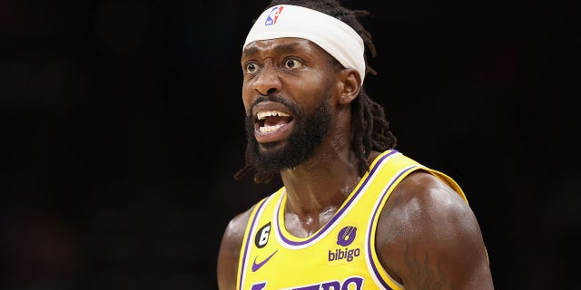 Patrick Beverley #21 of the Los Angeles Lakers reacts during the first half of the NBA game against the Phoenix Suns at Footprint Center on November 22, 2022 in Phoenix, Arizona. The Suns defeated the Lakers 115-105.