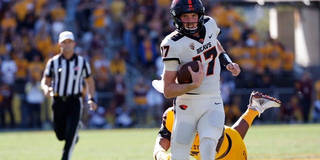 Defensive lineman B.J. Green II of the Arizona State Sun Devils tackles quarterback Ben Gulbranson (17) of the Oregon State Beavers during the first half at Sun Devil Stadium Nov. 19, 2022, in Tempe, Ariz. The Beavers beat the Sun Devils 31-7. 