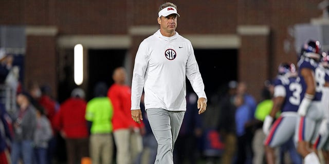 Head coach Lane Kiffin of the Mississippi Rebels looks on before the game against the Mississippi State Bulldogs at Vaught-Hemingway Stadium on November 24, 2022, in Oxford, Mississippi. 