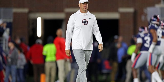 Mississippi Rebels head coach Lane Kiffin watches before a game against the Mississippi State Bulldogs at Vought Hemingway Stadium on November 24, 2022 in Oxford, Mississippi. 