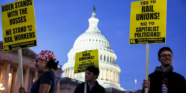 Activists in support of unionized rail workers protest outside the U.S. Capitol on Nov. 29, 2022, in Washington, D.C.