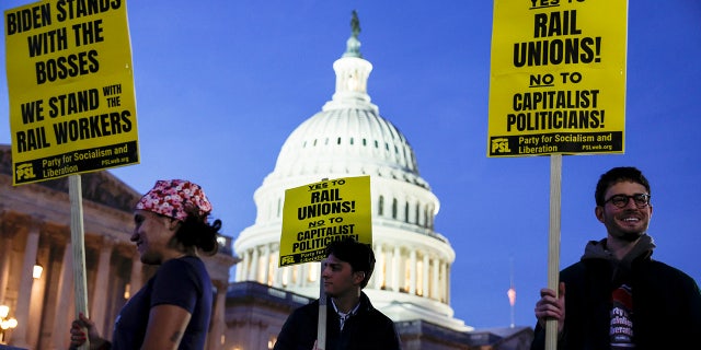 Activists in support of unionized rail workers protest outside the U.S. Capitol on Nov. 29, 2022, in Washington, D.C.