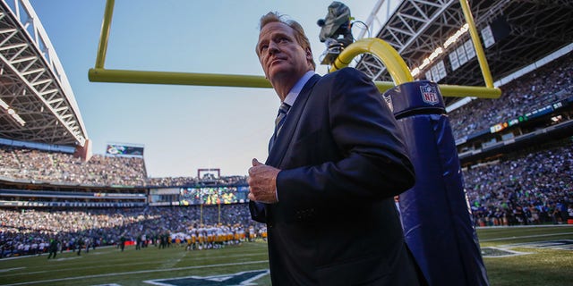 NFL commissioner Roger Goodell walks the sidelines prior to the game between the Seattle Seahawks and the Green Bay Packers at CenturyLink Field on September 4, 2014 in Seattle, Washington. 