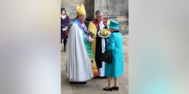 Queen Elizabeth II greets then-Bishop of Sheffield Steven Croft as she arrives at Sheffield Cathedral for the traditional Royal Maundy Service at Sheffield Cathedral on April 2, 2015, in Sheffield, England.