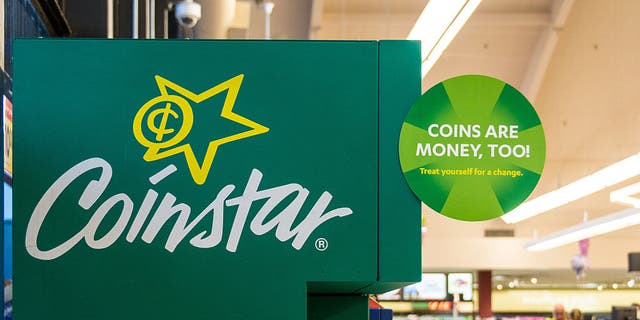 Coinstar kiosks in a Kroger's grocery store.
