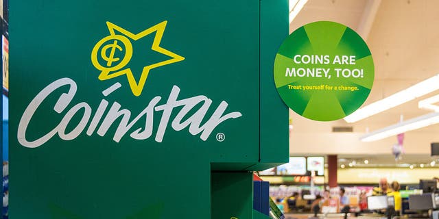 Coinstar kiosks in a Kroger's grocery store.