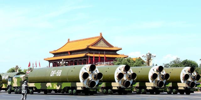 FILE -- Nuclear missiles are seen during a parade in Beijing, capital of China, Sept. 3, 2015. China on Thursday held commemoration activities, including a grand military parade, to mark the 70th anniversary of the victory of the Chinese People's War of Resistance Against Japanese Aggression and the World Anti-Fascist War. 