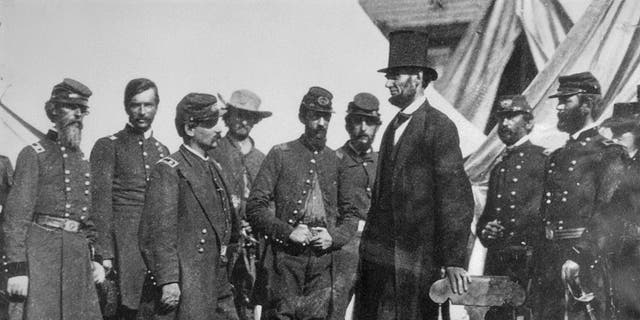 President Abraham Lincoln with General George B. McClellan at his headquarters at Antietam, October 3, 1862.