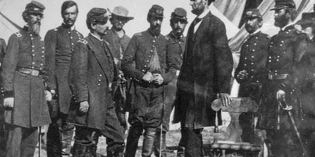 President Abraham Lincoln with General George B. McClellan at his headquarters at Antietam, October 3, 1862.