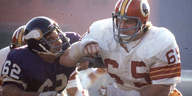 Washington Redskins defensive tackle Dave Butz takes on center Ed White of the Minnesota Vikings in the 1976 NFC Championship Game in Metropolitan Stadium in Minneapolis on Dec. 18, 1976.
