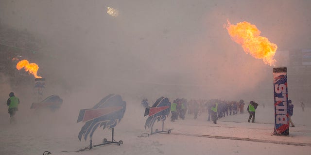Pyrotechnics erupt flames during pregame ceremonies before the game between the Buffalo Bills and the Indianapolis Colts at New Era Field on December 10, 2017, in Orchard Park, New York. 