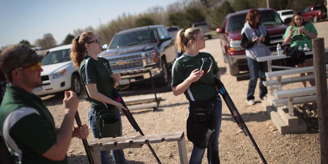 Students from the Osage High School trap team compete in a trapshooting match at the Mitchell County Trap Range on May 5, 2018, in Osage, Iowa. Last year over 3,500 students participated in the Iowa State High School Trap Championships held in Cedar Falls.