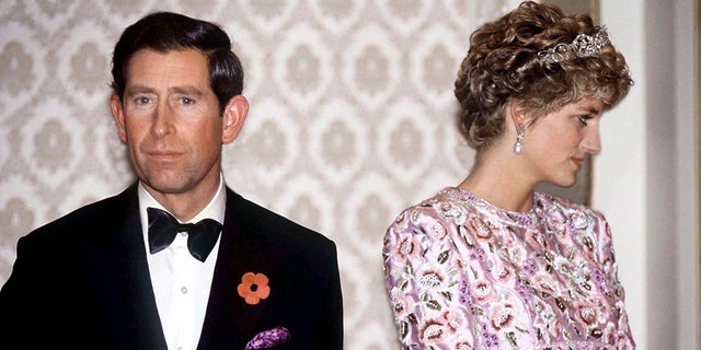 King Charles and Princess Diana looking glum