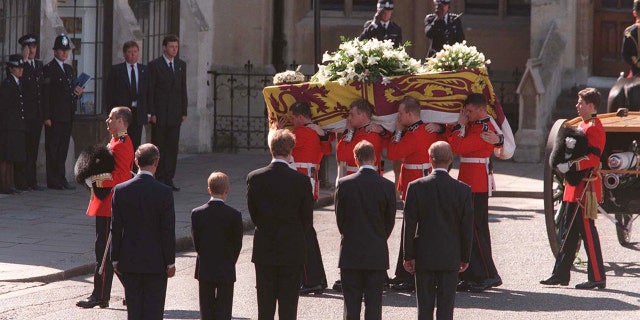 The Duke of Edinburgh, Prince William, Earl Spencer, Prince Harry and the Prince of Wales following the coffin of Diana, Princess of Wales