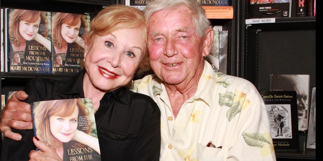 Actors Michael Learned, left, and Ralph Waite attend the signing of Mary McDonough's book "Lessons From the Mountain: What I Learned From Erin Walton" at Book Soup on April 16, 2011, in West Hollywood, California. Waite passed away in 2014 at age 85.