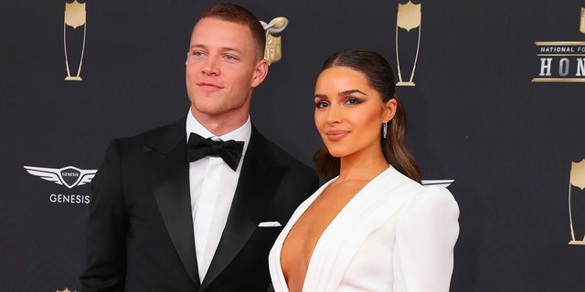Carolina Panthers running back Christian McCaffrey  and Olivia Culpo pose on the Red Carpet poses prior to the NFL Honors on February 1, 2020 at the Adrienne Arsht Center in Miami, Florida.
