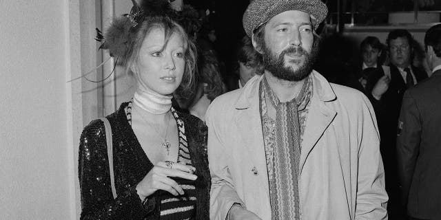 Eric Clapton and Pattie Boyd at the premiere of Ken Russell's film version of The Who's rock opera "Tommy" at the Leicester Square Theatre in London, circa 1975. They married in 1979.