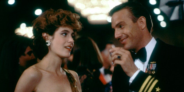 Sean Young, left, and Kevin Costner on the set of "No Way Out," based on the novel by Kenneth Fearing and directed by Roger Donaldson.