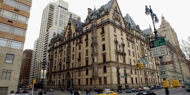 The Dakota apartment building is across the street from the Strawberry Fields memorial to John Lennon in Central Park, New York City.