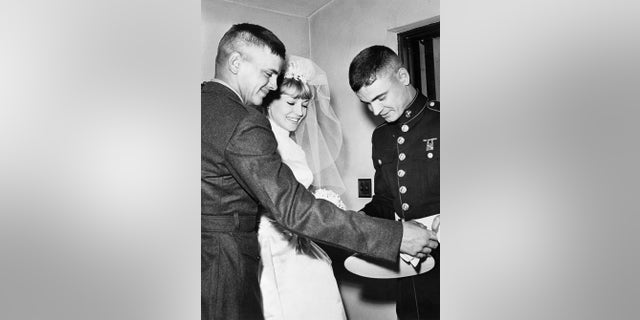 Phil Everly, left, congratulates brother Don Everly, who married screen star Venetia Stevenson. Everly and Stevenson were married from 1962 until 1970.