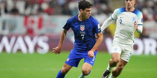 Gio Reyna #7 of the United States turns with the ball during a FIFA World Cup Qatar 2022 Group B match between England and USMNT at Al Bayt Stadium on November 25, 2022 in Al Khor, Qatar.