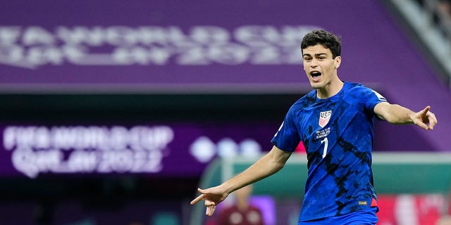 USA and Borussia Dortmund attacking midfielder Giovanni Reyna gives instructions during the FIFA World Cup Qatar 2022 Group B match between England and USA at Al Bayt Stadium on November 25, 2022 in Al Khor, Qatar.