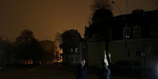 Greg Palkot filming in the dark of Kyiv with his cameraman. Some 450,000 people in Kyiv were without power last week following Russia's targeting of Ukraine's energy grid.