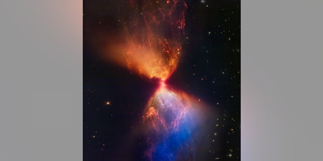 The dark cloud protostar L1527, shown in this image from NASA's James Webb Space Telescope Near Infrared Camera (NIRCam), is embedded within a cloud of material that fuels its growth.
