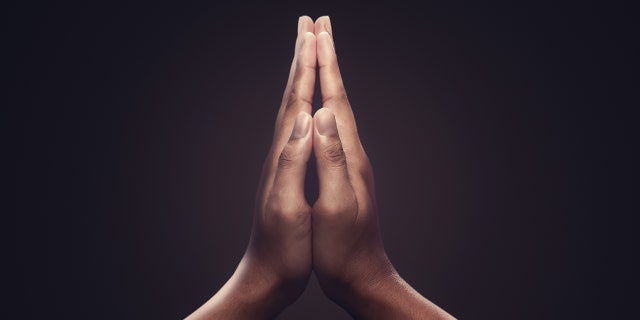 Hands in prayer