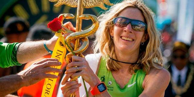 United States long-distance runner Camille Herron reacts after winning the 89km Comrades Marathon between Durban and Pietermaritzburg, South Africa, on June 4, 2017, in Pietermaritzburg. The annual ultra marathon attracted over 17,000 runners from around the world.