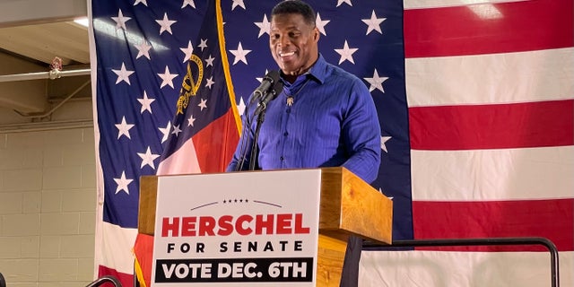 GOP Senate nominee Herschel Walker holds a rally on Nov. 30, 2022 in Dalton, Georgia, ahead of the state's Dec. 6 Senate runoff election.