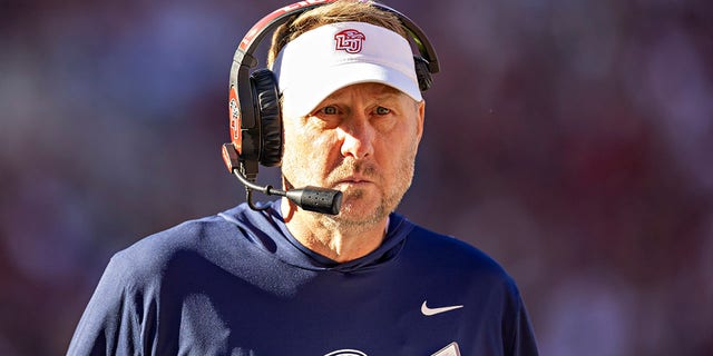 Head Coach Hugh Freeze of the Liberty Flames on the sidelines during a game against the Arkansas Razorbacks at Donald W. Reynolds Razorback Stadium on November 5, 2022 in Fayetteville, Arkansas.