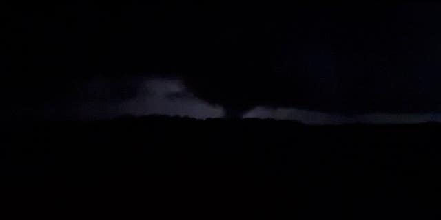 A tornado forms in Mound, Louisiana on Tuesday evening.