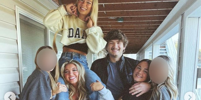 Madison Mogen, top left, smiles on the shoulders of her best friend, Kaylee Goncalves, as they pose with Ethan Chapin, Xana Kernodle, and two other housemates in Goncalves' final Instagram post, shared the day before the four students were stabbed to death. 